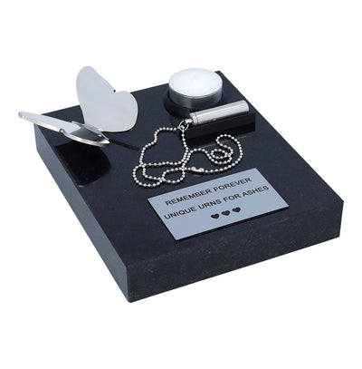Keepsake with a base, memorial plaque and butterflu. Outdoor keepsake